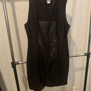 Faux leather panel on black dress